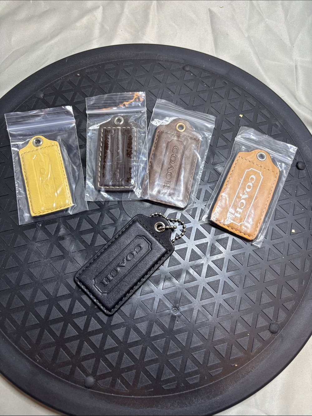 Coach Leather Key Tag Set in Black, Yellow, Dark Brown, Medium Brown, Tan